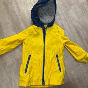 Impidimpi Regenjacke Gr. 98 gelb-marineblau mit Kapuze